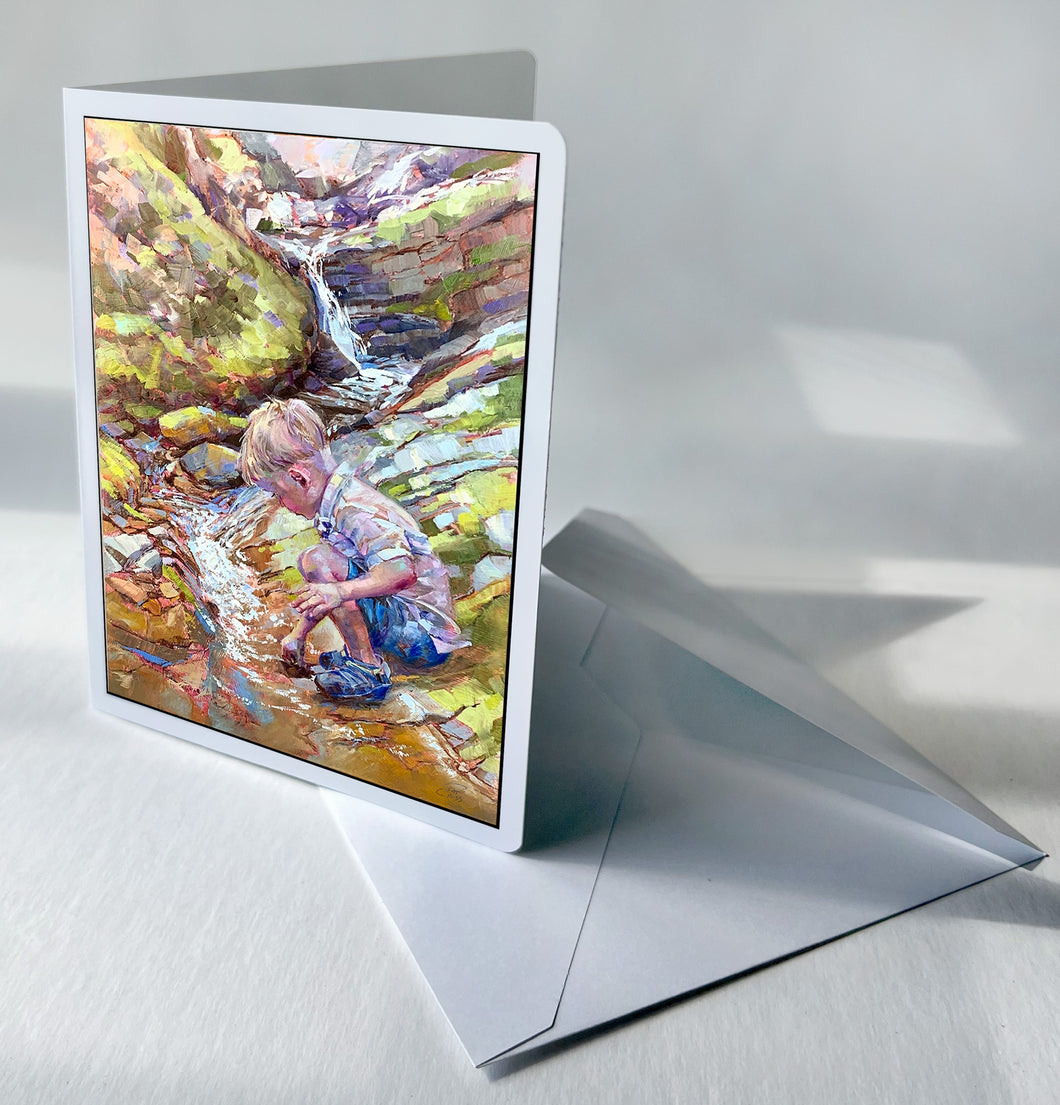 This notecard by Pat Cross titled Creekside Curiosity tells of the adventurous curiosity of a toddler at along a creek bed.