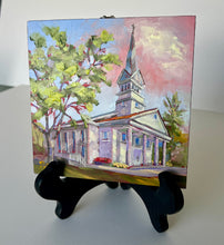 Load image into Gallery viewer, Shown on display easel, original oil painting titled Greenbrier Chapel in Summer by Pat Cross.
