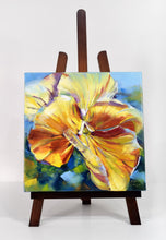 Load image into Gallery viewer, Sunny Petunia original oil painting on display easel by Pat Cross.

