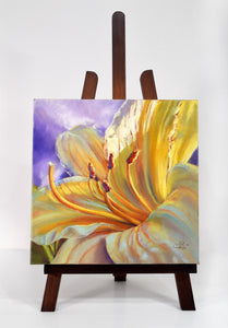 Yellow Stella Lily original oil painting on easel by Pat Cross.